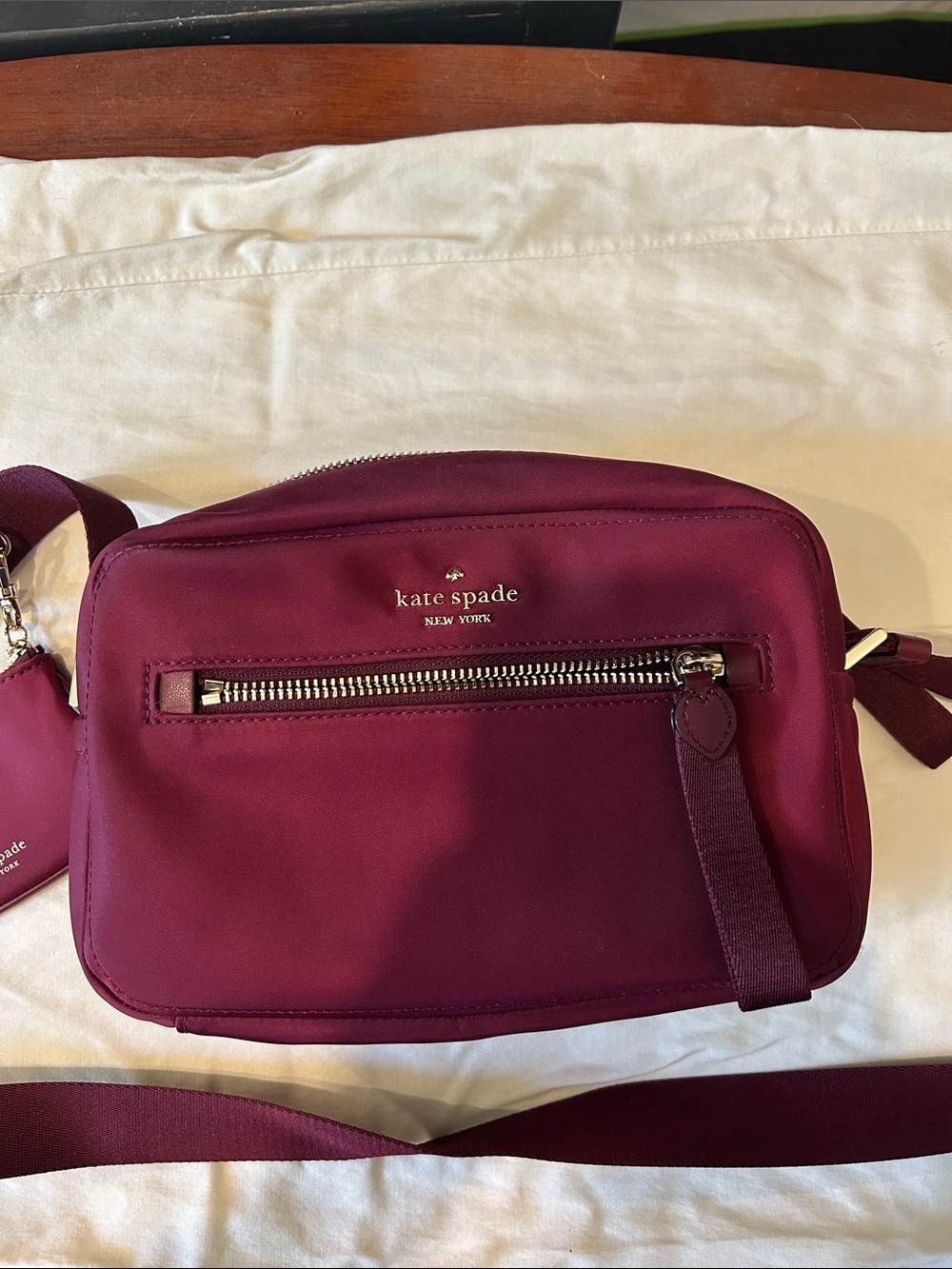 Kate Spade camera bag in plum